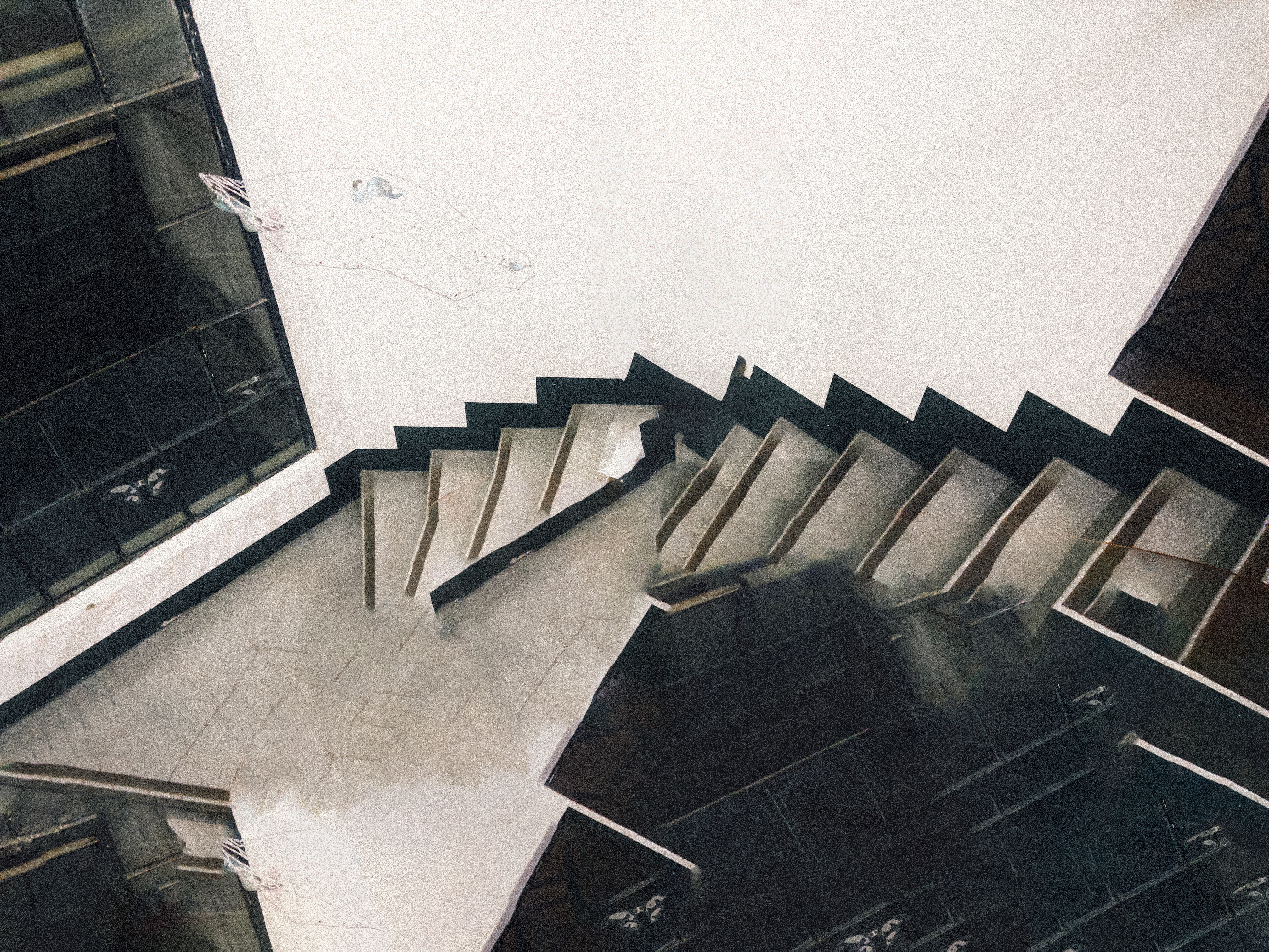 Errol Aaron Merjudio standing on a grand spiral staircase